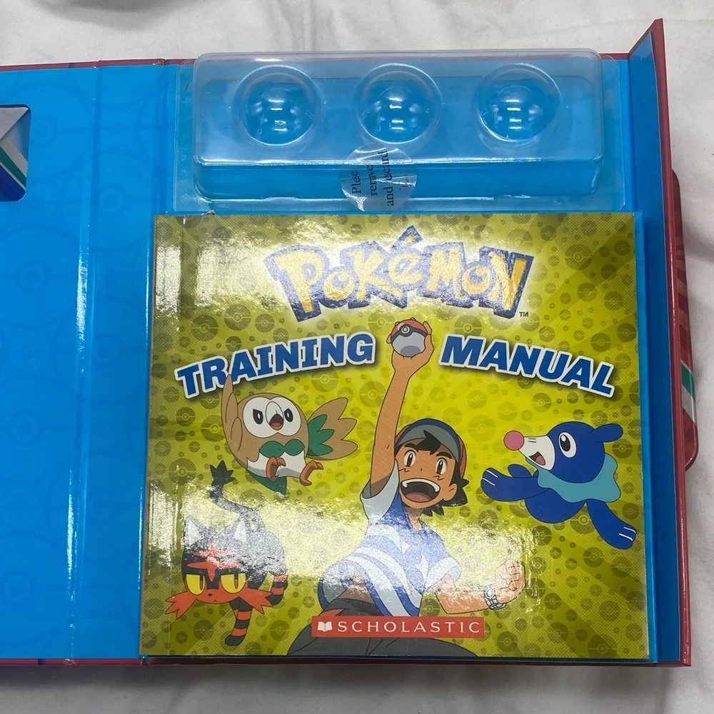 Pokemon Training Manual & Tin Set